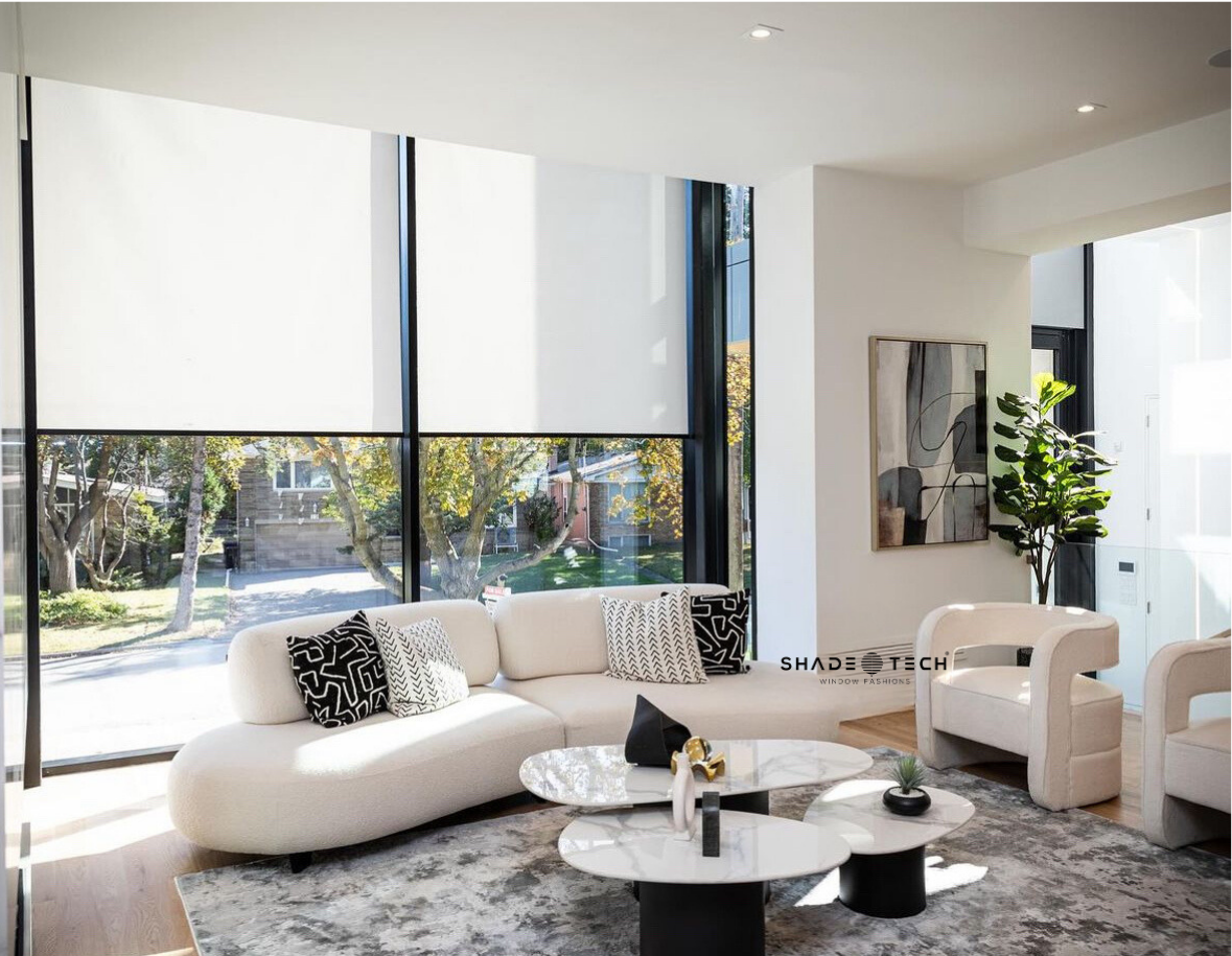 Motorized roller shades in a modern living room
