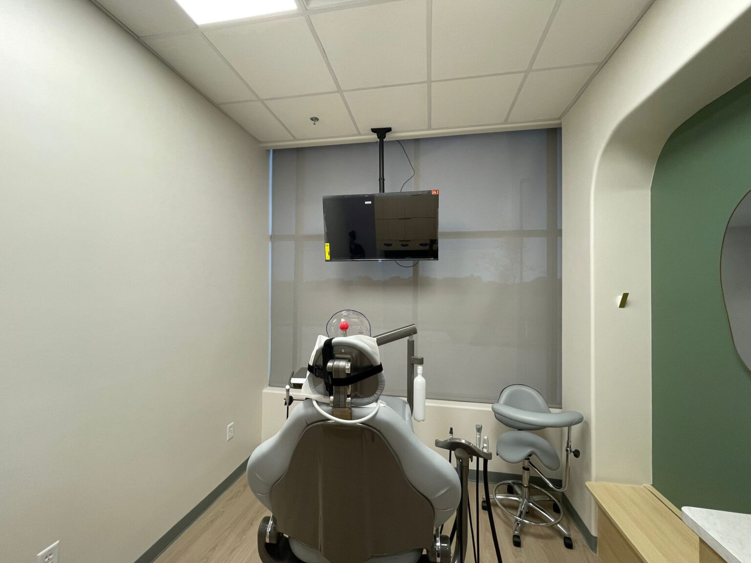 Solar roller shade in a dental office operatory in Dallas–Fort Worth
