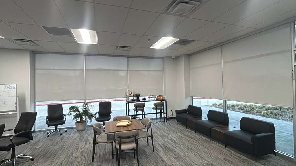 Office lounge with solar roller shades
