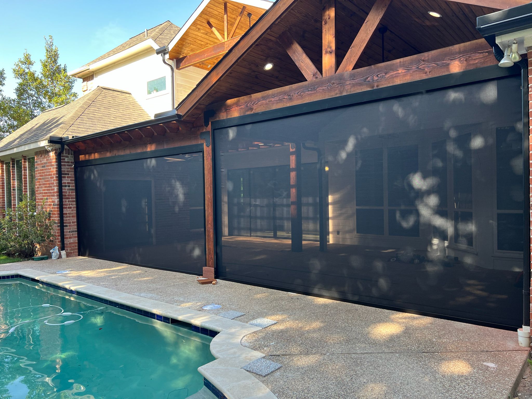 Custom shades and screens installed by Shadeotech for a home near Lake Dallas, Texas